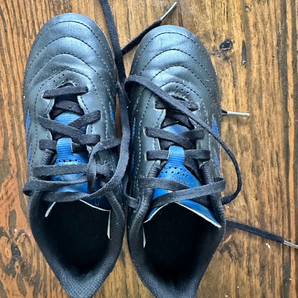 Adidas Black and Blue cleats